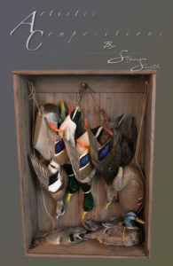 Puddle duck grouping with antique decoy in a glassed shadow box 1 scaled